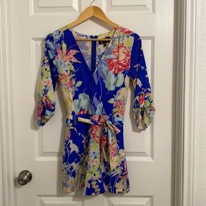Floral romper with pockets (bundle 3 or more items for $5 each)